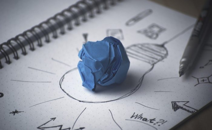 crumpled paper on a lightbulb picture